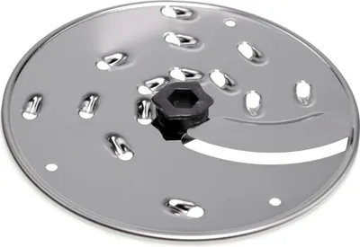 A close-up, top-down view of a food processor blade attachment.