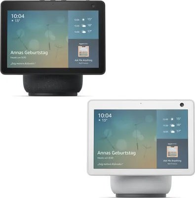 Two Amazon Echo Show 10 smart home hubs with screens, one black and one white, are displayed side-by-side against a white background.