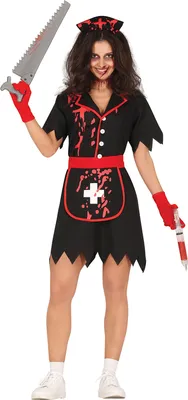 A woman in a zombie nurse costume holding a saw and a syringe.