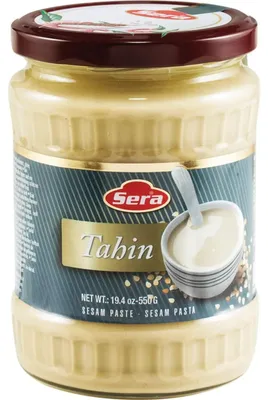 Produktbild von Handgemachte Sesampaste – Cremiges, hochwertiges Tahini in einem Glasbehälter, 550g