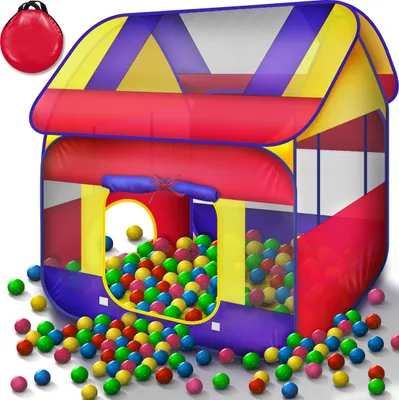 A colorful play tent filled with balls, with some balls scattered around it.