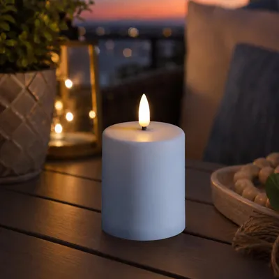 Produktbild von LED Mini Kerze/Grabkerze - H: 10cm/D: 6,1cm - Timer/Sensor - für Innen/Außen - bis 1200h - weiß