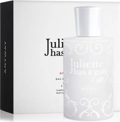 A perfume bottle and its box are displayed against a white background.