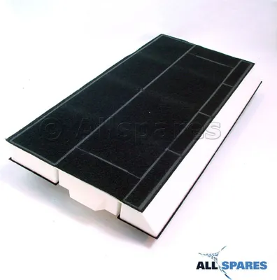 A black carbon filter with white foam edges on a white background.