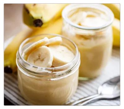 Produktbild von Spritzschutz Herdabdeckplatte Schneidebrett aus Glas Bananenshake 1-Teilig (60x52cm)