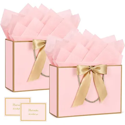 Productafbeelding van Twee cadeautasjes met handvat, roze, inclusief 4 vellen cellofaanpapier en 2 wenskaarten