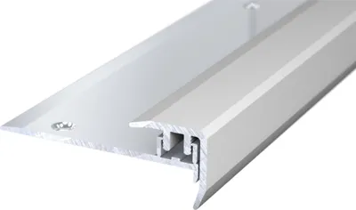 A close-up, angled view of a metal stair nosing profile against a white background.