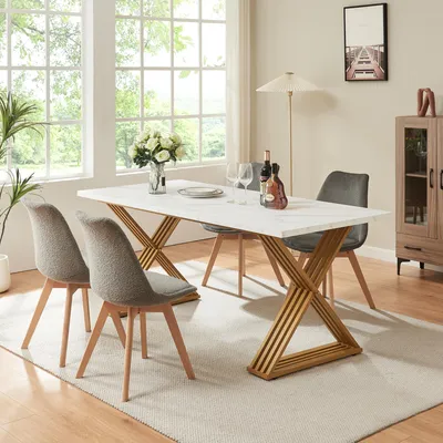 A dining room scene with a marble-look table and chairs, set for a meal.
