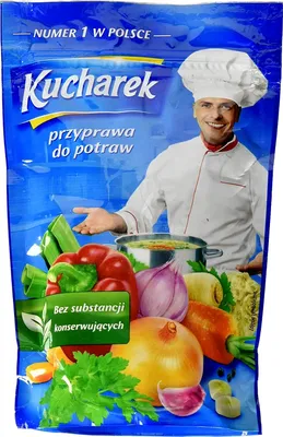 A pouch of Kucharek seasoning with vegetables and a chef.