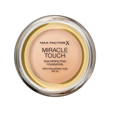A top-down view of a Max Factor Miracle Touch foundation compact.
