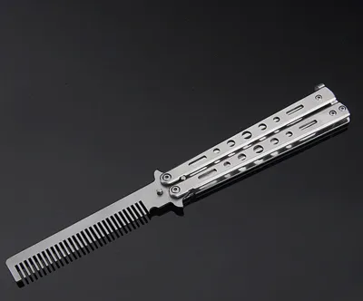 A butterfly comb is shown on a black background.