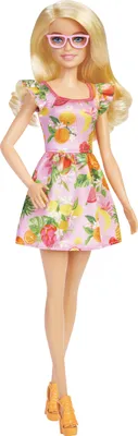 Produktbild von Barbie Fashionistas Puppe mit blonden Haaren und Kleid mit Obstmuster, Rüschenärmeln, orangefarbenen Plateauschuhen und rosafarbener Brille, für Kinder von 3 bis 8 Jahren