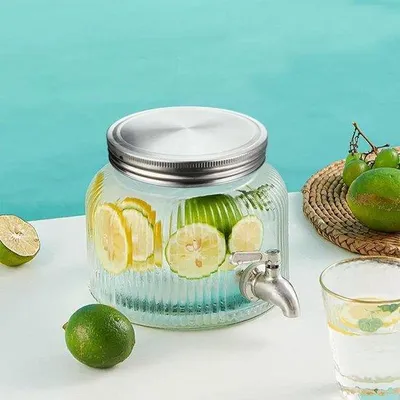 Produktbild von Gläserner Kaltgetränkebehälter mit Hahn - rostrühriger Stahlhahn - Saftbehälter für Wasser Saft Eis Sonne Tee Kaffee - kleiner kalter Getränkebehälter - klar runder