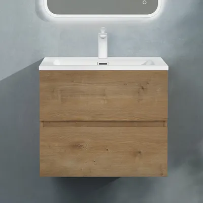 A wall-mounted bathroom vanity with a sink and faucet against a textured gray wall.