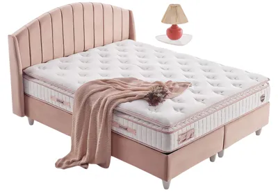 Productafbeelding van Elegant bed in zachte roze kleur, gemaakt van duurzame materialen