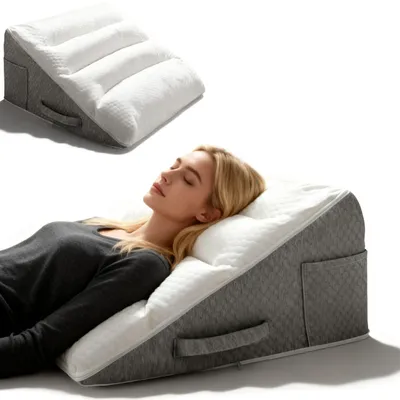 Image de Coussin en forme de coin pour lit et canapé, offrant un soutien de qualité pour le dos et les jambes