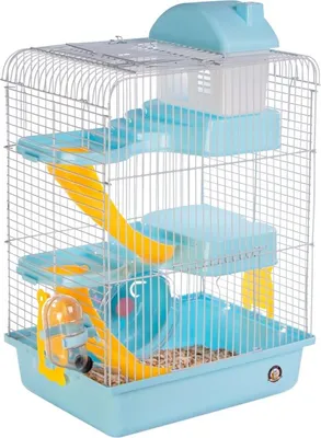 A multi-level hamster cage with accessories.