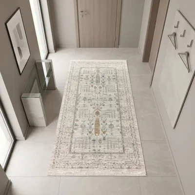 Image de Tapis moderne crème avec motif ornemental, bordure et franges. Dimensions : 80 x 150 cm
