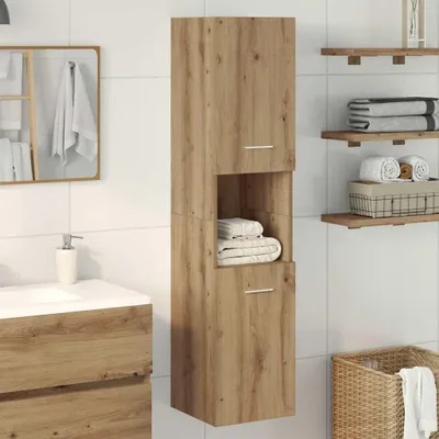 A bathroom cabinet with towels and shelves.