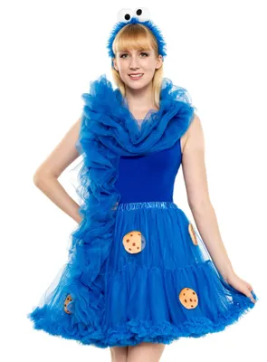 A woman wearing a Cookie Monster costume.