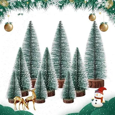 Image de Petit sapin de Noël artificiel vert et neige