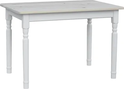 A white wooden dining table with turned legs.