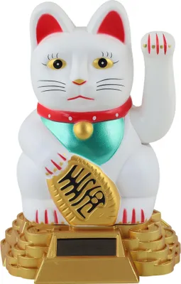 A white solar-powered lucky cat figurine.