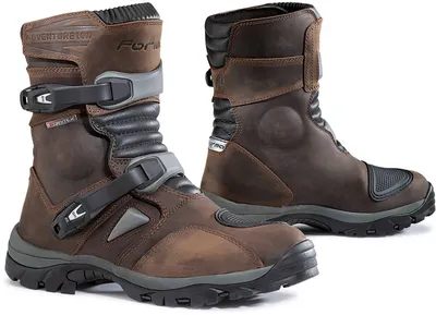 A pair of brown motorcycle boots are shown against a white background.