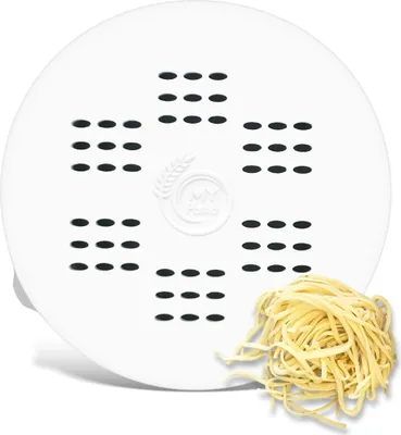 A white pasta maker disk with multiple holes and a small pile of uncooked linguine pasta next to it. A logo is visible on the disk.