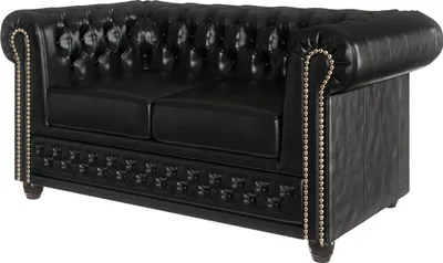 A black leather Chesterfield sofa is shown from the front.