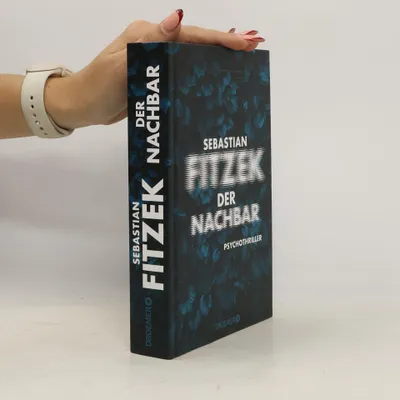 A hand holding a book.