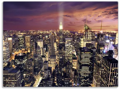 Produktbild von Wallario Glasunterlage, Schneidebrett aus Glas, Größe 30 x 40 cm, Motiv New York bei Nacht - Panoramablick über die Stadt
