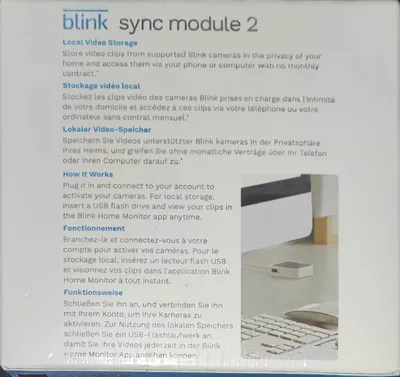 The image shows the packaging of a Blink Sync Module 2, with text describing its features and functions in multiple languages.
