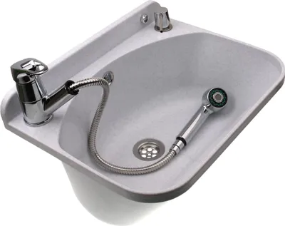 A light gray sink with a chrome faucet and a pull-out spray nozzle is shown against a white background.