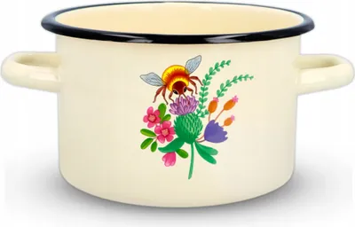 A cream-colored enamel pot with a decorative motif of a bee on a flower.