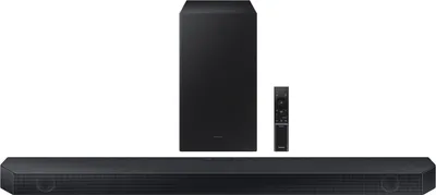 A black soundbar, subwoofer, and remote control are displayed against a white background.