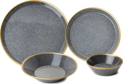 A set of four dark gray ceramic dishes with gold trim, arranged on a white background.