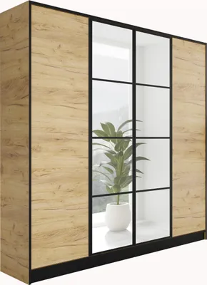 A wardrobe with wooden doors and mirrored sections.