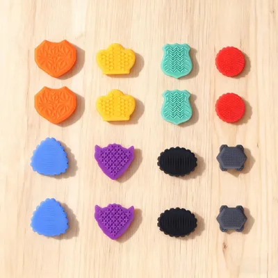 Produktbild von 16 Stück Fidget Toys Sensory Stones, Vielseitiges Anti-Stress Finger Spielzeug Set, Stressabbau Sensorik Spielzeug für Erwachsene & Kinder bei ADHS
