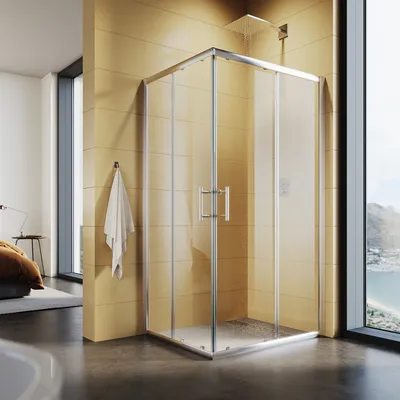 A modern bathroom with a glass shower enclosure, a large window overlooking a scenic view, and a bed in the background.