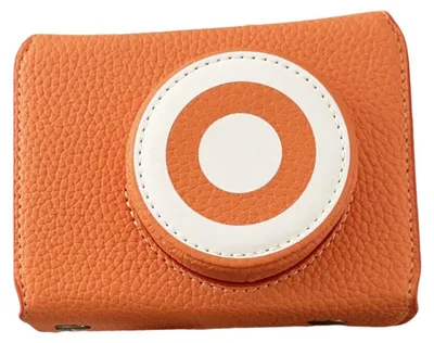 Productafbeelding van Retro cameratas van Polyurethanleer, inclusief halve hoes, klapdeksel en verstelbare schouderband, geschikt voor de Fujifilm XE5 in de kleur oranje