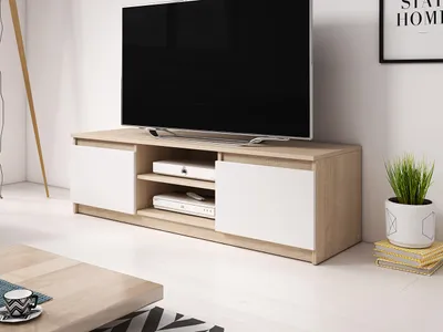 A modern TV stand with two cabinets and shelves, holding a large TV.