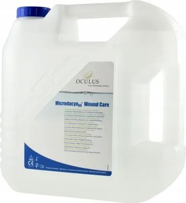 A large white plastic jug with a blue cap, containing a wound care solution.