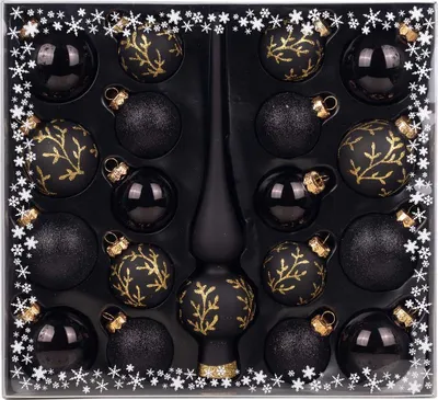 A set of black Christmas ornaments and a tree topper in a box.