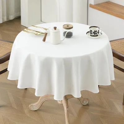 Immagine prodotto di Tovaglia rotonda Azomor® da 140 cm, idrorepellente e lavabile, con un elegante effetto lino