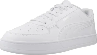 A white Puma sneaker is shown against a white background.