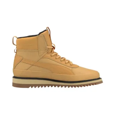 A single tan Puma boot is shown against a white background.