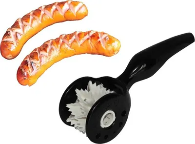 A black sausage cutter tool and two grilled sausages on a white background.