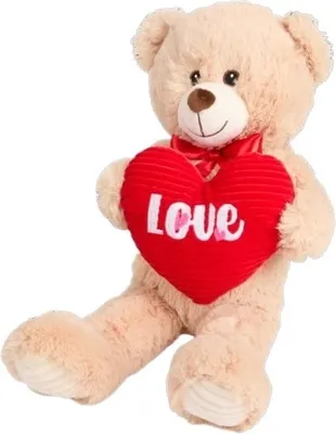 A plush teddy bear holding a red heart with the word 'LOVE' on it.