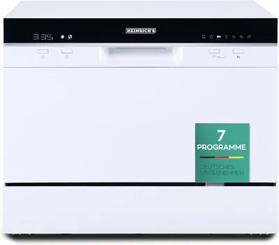 A white countertop dishwasher with a black control panel and a green sticker indicating "7 PROGRAMME DEUTSCHES UNTERNEHMEN".